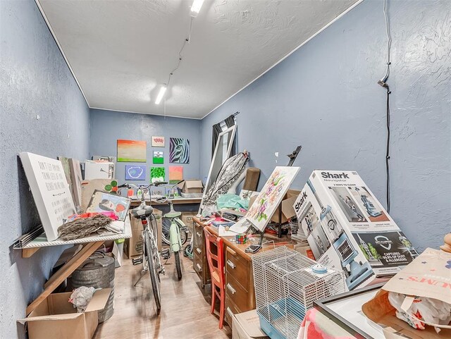 miscellaneous room featuring hardwood / wood-style floors