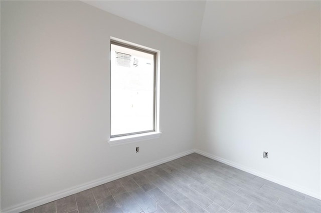 1921 Taines Turn, Norman, OK 73072 - unfurnished room with wood finished floors and baseboards