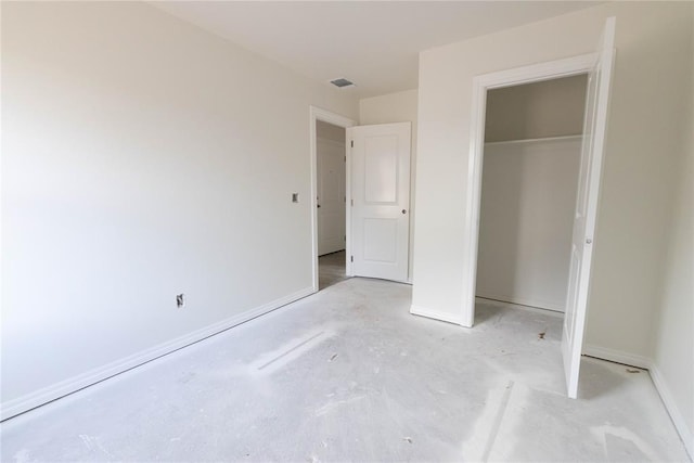 1921 Taines Turn, Norman, OK 73072 - unfurnished bedroom featuring a closet and baseboards