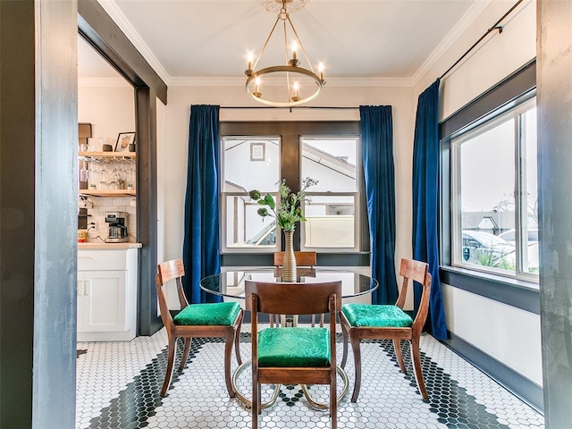 sitting room with crown molding and a chandelier