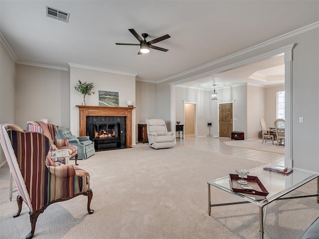 living room with light carpet, ceiling fan, and crown molding