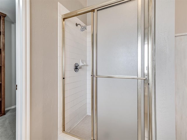 bathroom featuring walk in shower