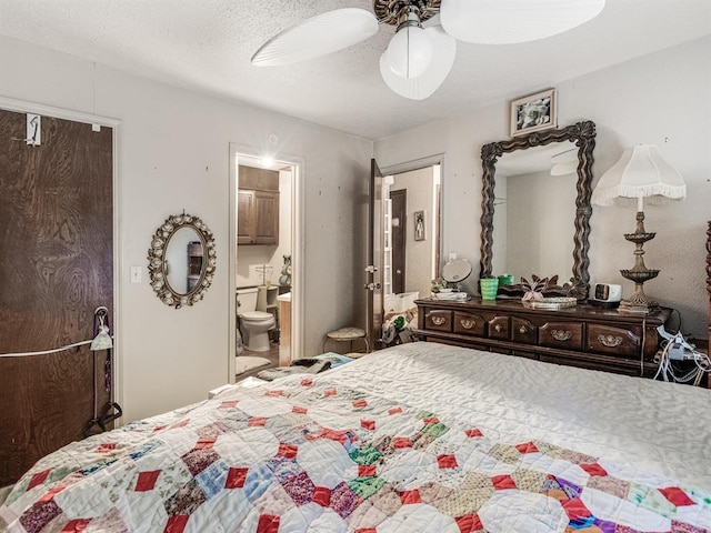 bedroom featuring a textured ceiling, ceiling fan, and ensuite bathroom