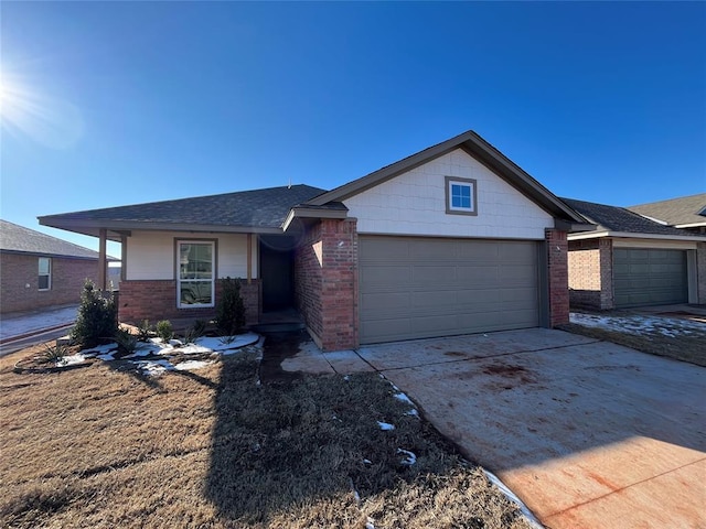 single story home with an attached garage, concrete driveway, and brick siding