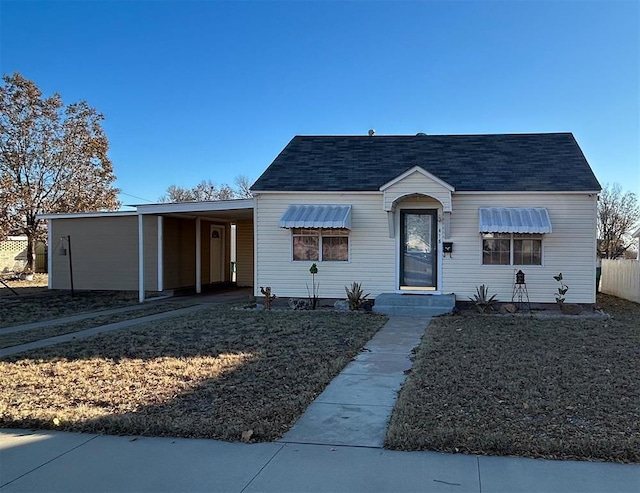 view of front of house featuring a carport