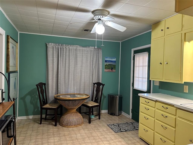 kitchen with wall oven and ceiling fan