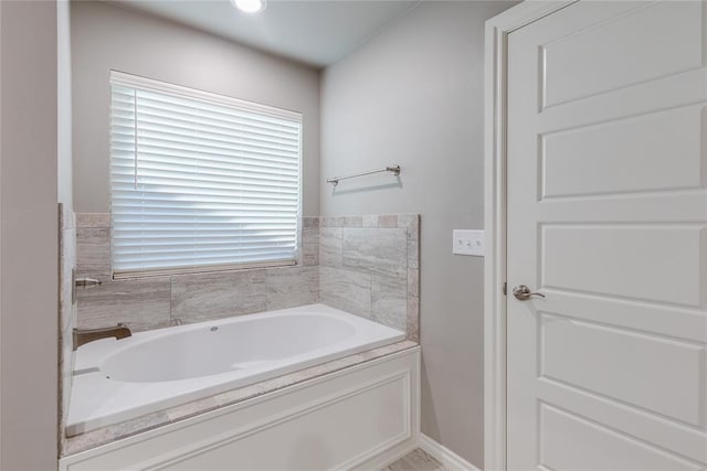 bathroom with a washtub