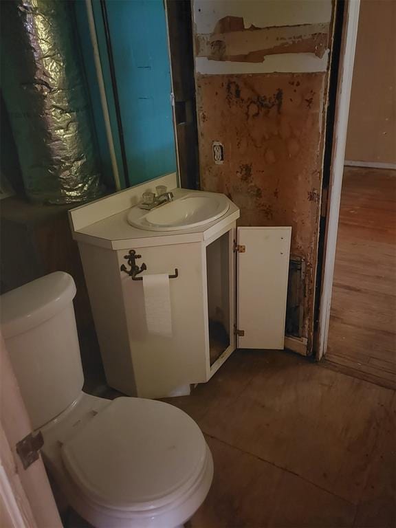 half bath with toilet and vanity