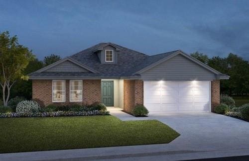 view of front of property with a front lawn and a garage