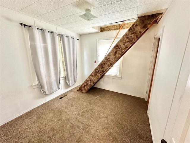 unfurnished room with carpet