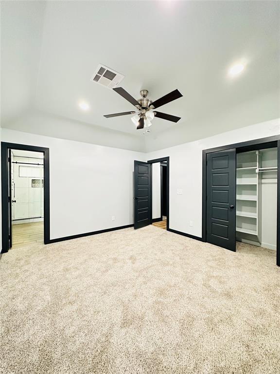 9 SW 24th St, Oklahoma City, OK 73109 - unfurnished bedroom featuring light colored carpet and a ceiling fan