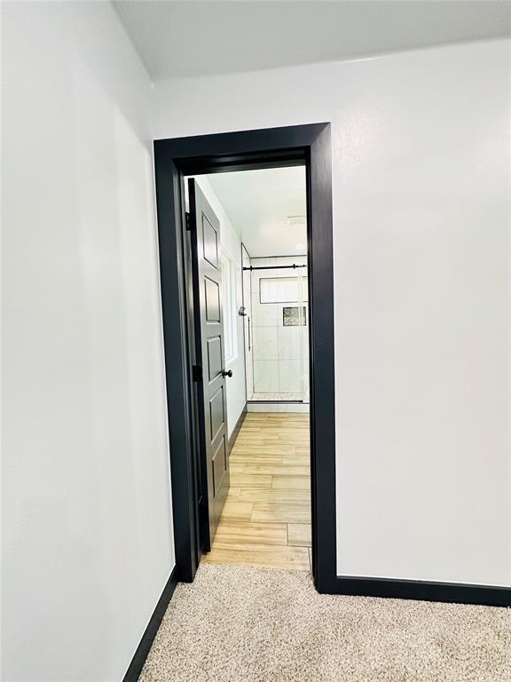 9 SW 24th St, Oklahoma City, OK 73109 - hallway featuring baseboards