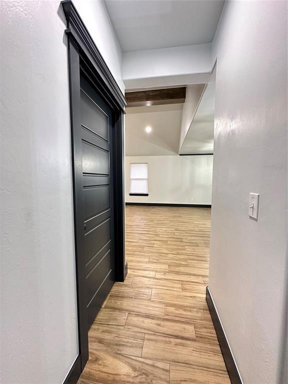 hallway featuring light hardwood / wood-style floors