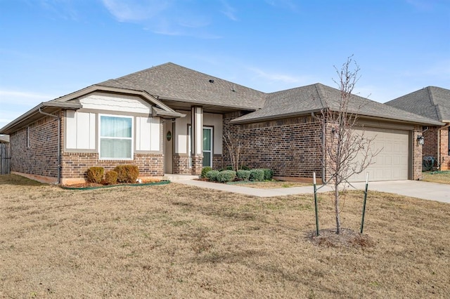 view of front facade with a front lawn and a garage