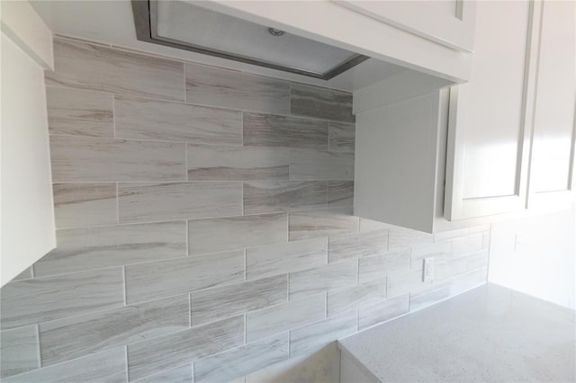 details featuring decorative backsplash