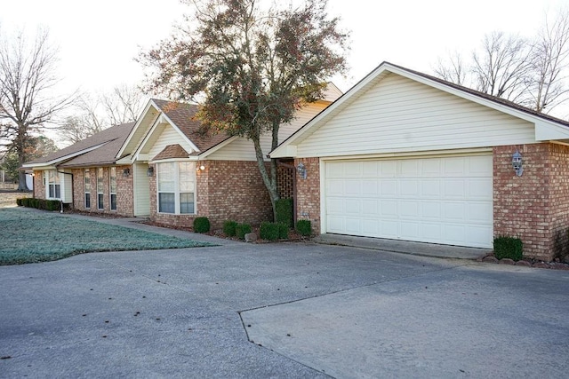 ranch-style home with a garage