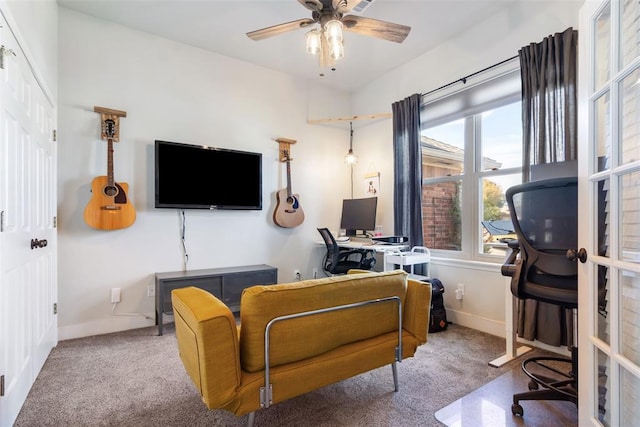 office area featuring ceiling fan and carpet