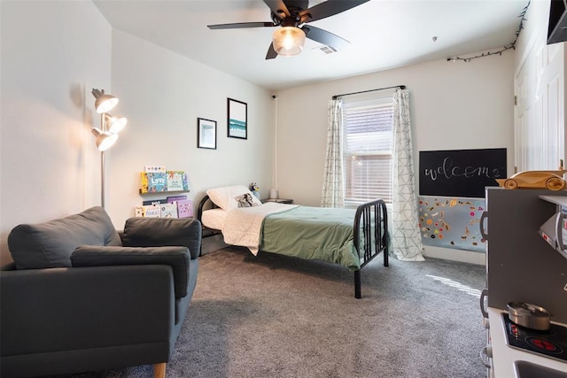 carpeted bedroom with ceiling fan