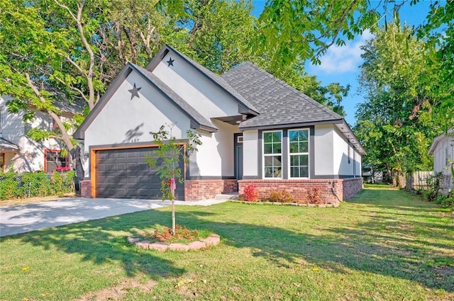 view of front of house with a front yard and a garage