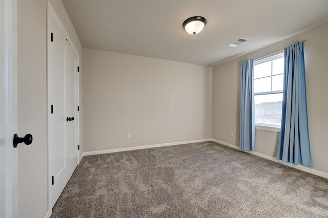 unfurnished bedroom featuring carpet flooring