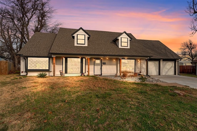 new england style home with a yard