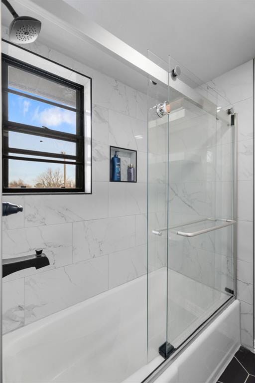 bathroom with tile patterned flooring and enclosed tub / shower combo