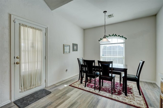 dining room featuring light hardwood / wood-style flooring