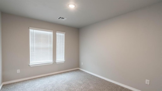 13581 Hickory Way, Edmond, OK 73025 - spare room with baseboards and carpet