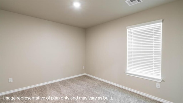 13581 Hickory Way, Edmond, OK 73025 - empty room featuring light carpet and baseboards