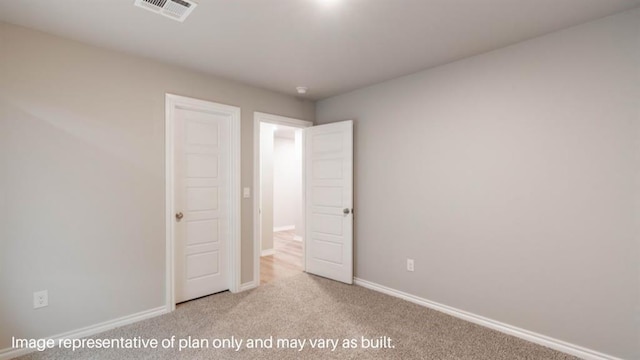 13581 Hickory Way, Edmond, OK 73025 - unfurnished bedroom featuring carpet floors and baseboards