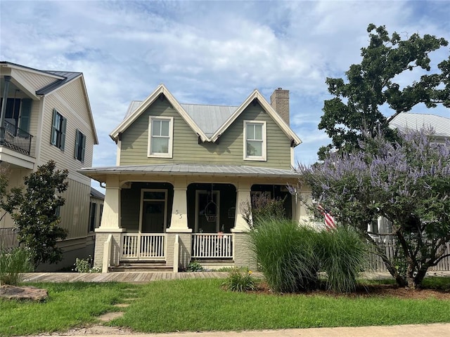 view of front of property featuring covered porch