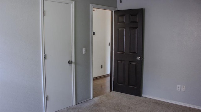 interior space featuring light colored carpet