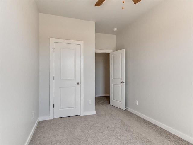 13074 Mannington Rd, Edmond, OK 73025 - unfurnished bedroom with carpet flooring and a ceiling fan