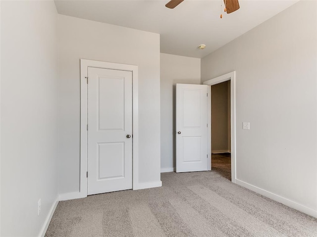 13074 Mannington Rd, Edmond, OK 73025 - unfurnished bedroom featuring carpet floors and a ceiling fan