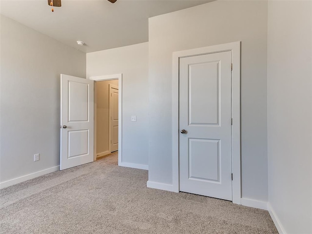 13074 Mannington Rd, Edmond, OK 73025 - unfurnished bedroom with light colored carpet