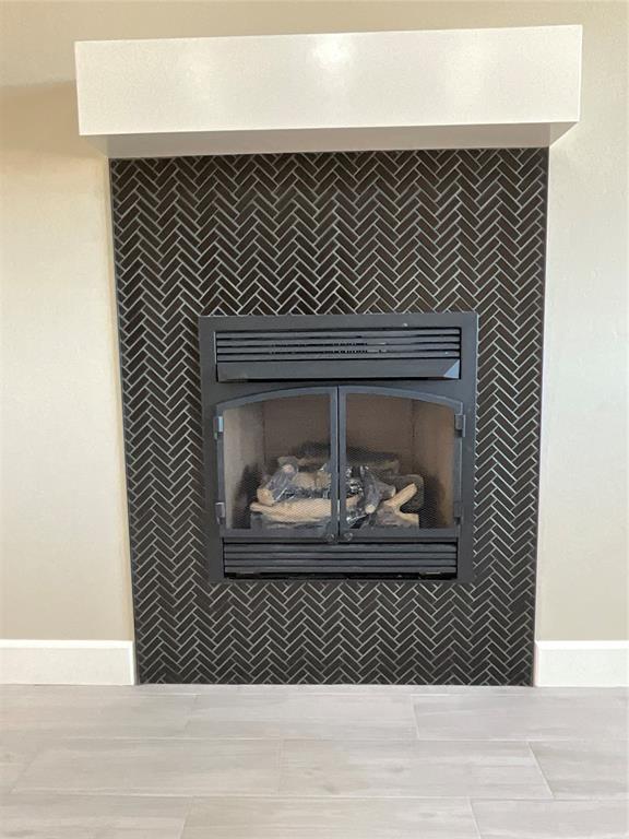 interior details with a fireplace