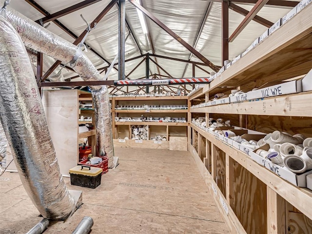 wine area featuring lofted ceiling