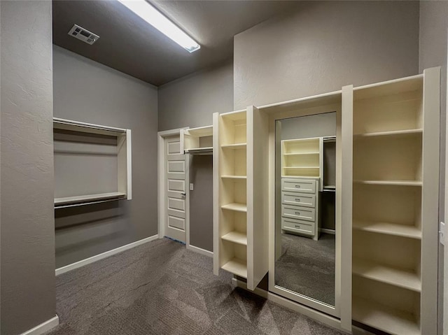 4309 NW 152nd Pl, Edmond, OK 73013 - walk in closet featuring carpet flooring and visible vents