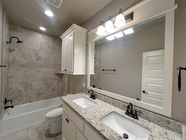 4309 NW 152nd Pl, Edmond, OK 73013 - full bath featuring visible vents, a sink, toilet, and bathtub / shower combination