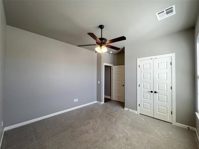 4309 NW 152nd Pl, Edmond, OK 73013 - unfurnished bedroom with a ceiling fan, a closet, baseboards, and visible vents