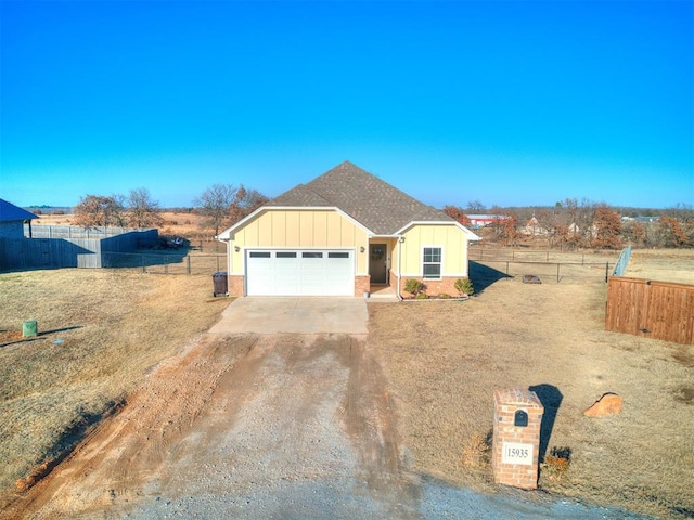 view of front of property featuring a garage