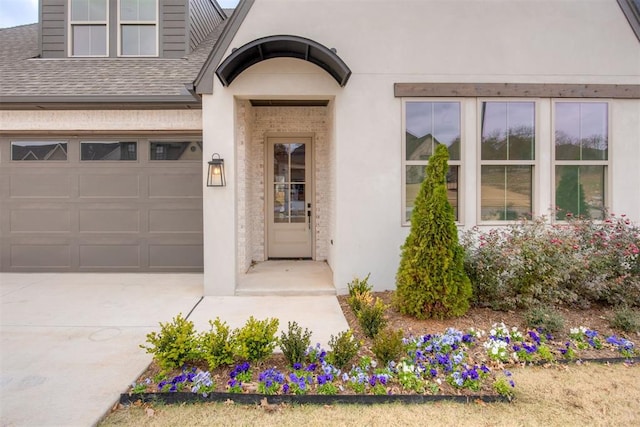 entrance to property featuring a garage