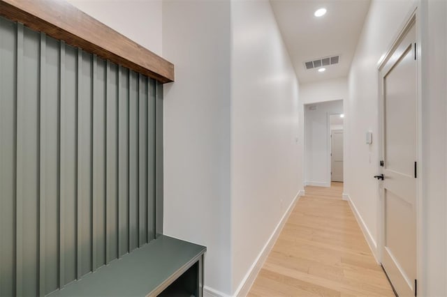 hallway featuring light hardwood / wood-style flooring