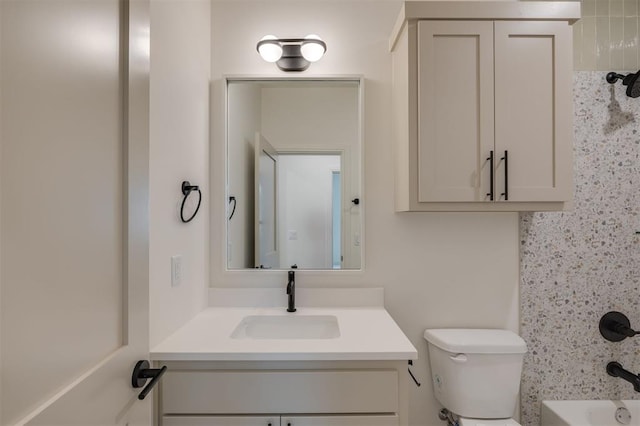 full bathroom featuring vanity, shower / bathtub combination, and toilet