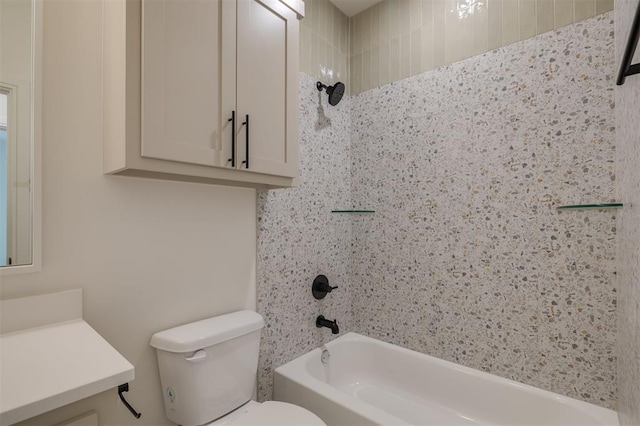 full bathroom with washtub / shower combination, vanity, and toilet