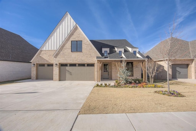 view of front of home with covered porch and a garage