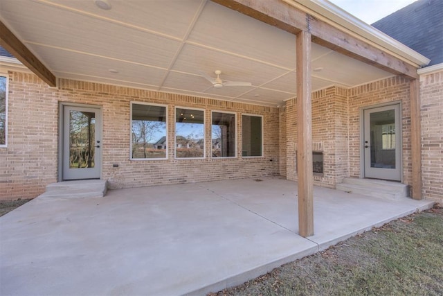 view of patio featuring ceiling fan