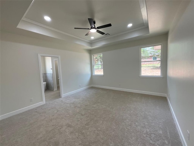 2402 Black Jack Way, Blanchard, OK 73010 - unfurnished room with carpet floors, ornamental molding, recessed lighting, a tray ceiling, and a ceiling fan