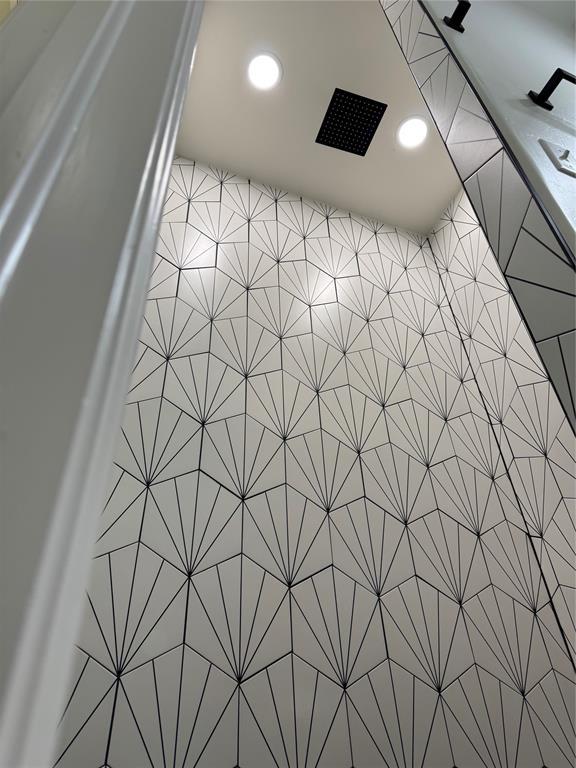 2402 Black Jack Way, Blanchard, OK 73010 - details featuring recessed lighting and tiled shower