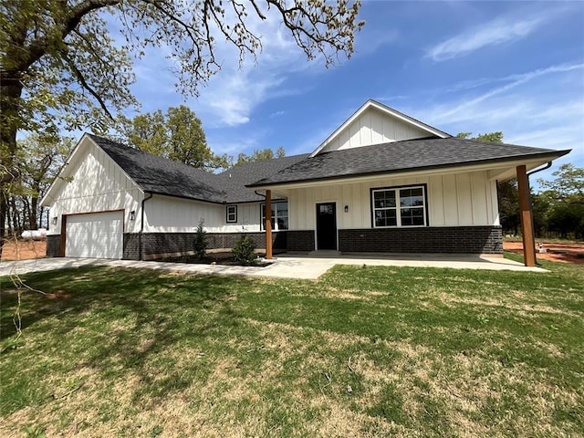 2402 Black Jack Way, Blanchard, OK 73010 - view of front facade featuring brick siding, an attached garage, a shingled roof, and a front lawn